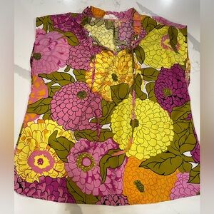 THML pink and yellow floral top featuring a ruffle neck with ties